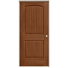 a brown door on a white wall