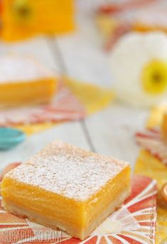 two pieces of cake sitting on top of napkins