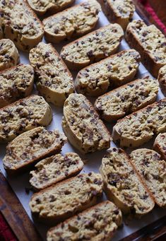 there are many pieces of bread on the tray