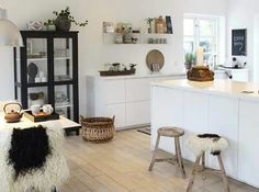 the kitchen is clean and ready to be used as a living room or dining area