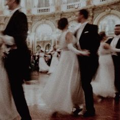 the bride and groom are dancing together at their wedding