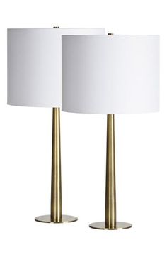 pair of brass table lamps with white shades