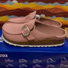 The Birkenstock Buckley Is A Semi-Open Moccasin-Style Clog That’s Instantly Recognizable As An Authentic Birkenstock Original Thanks To Its Exposed Cork Footbed. The Upper Is Made From High-Quality Nubuck Leather That Boasts A Natural, Rustic Appearance. Everyday Mules With Leather Footbed And Round Toe, Casual Pink Leather Mules, Leather Clogs With Almond Toe And Leather Footbed, Leather Almond Toe Clogs With Leather Footbed, Buckley Birkenstocks, Spring Clogs With Leather Lining And Round Toe, Leather Flat Clogs With Buckle Closure, Casual Spring Clogs With Leather Lining, Casual Mules With Leather Lining And Round Toe