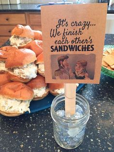 a sign that says it's easy we finish each other's sandwiches on a stick