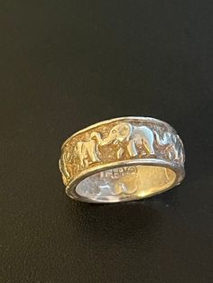 Need a dash of luck? This really cool Vintage Sterling Silver Elephants on Parade Ring shows a chain of elephants on a sterling silver ring, and is supposed to be for good luck! Signed OTT Sterling Silver Ring (maker's mark on inside of the ring). Size 7. Vintage / used. Normal wear and tear, but in really nice condition. See photos for details. Elephant Ring, Silver Elephants, For Good Luck, Maker's Mark, Ring Size 7, Makers Mark, Vintage Sterling Silver, Sterling Silver Ring, Band Rings