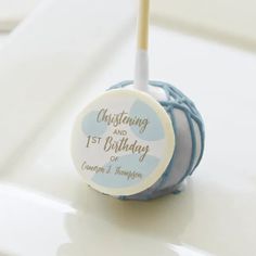 Add a touch of personalization and sweet treats to your child's first birthday and Christening celebration with these custom cake pops. Featuring blue polka dots and gold hue typography, this modern and chic design is sure to delight your guests. Customize with your baby boy's name for a unique and memorable treat. First Birthday Blue, Custom Cake Pops, Party Themes For Boys, Blue Dots, Baby Christening, Custom Cake