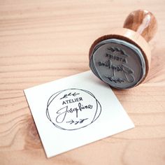 a rubber stamp with the words atelier japono on it next to a piece of paper