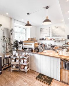 the interior of a coffee shop with lots of counter space