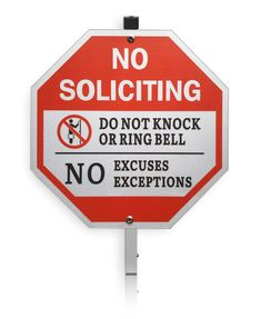 a red and white stop sign that says no soliciting don't knock or ring bell