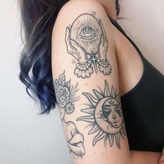 a woman's arm with tattoos on it and an image of the sun and moon