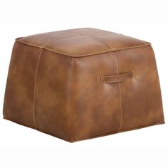 a brown leather ottoman with square stitching on it