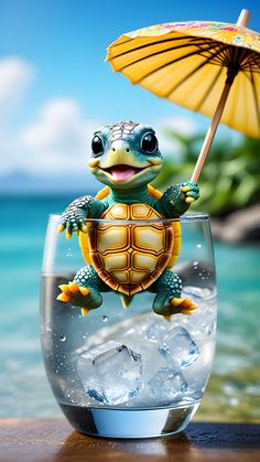 a little turtle sitting on top of a glass filled with water and holding an umbrella