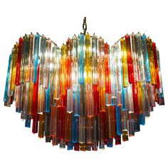 a multicolored chandelier hanging from the ceiling