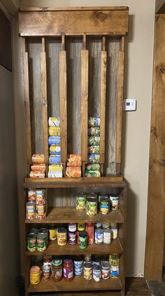 a wooden shelf filled with lots of food