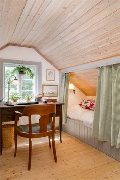 an instagram photo of a bedroom with a desk and bed in the corner, next to a window