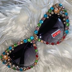 Gorgeous Bejeweled Sunglasses New Never Worn. Perfect For Any Outfit. A Needed Addition To Your Accessories Unbranded No Designer Name Rhinestones Sunglasses Perfect For Fun In The Sun Pack In Your Suitcase For Your Next Vacation Take In Your Purse For A Walk In The Park Great For A Day At The Beach In Your Sun Hat And Bikini Or Cool Shorts On Your Surfboard Keywords: Stone Ring The Gold Silver Ring Wedding Engagement Date Night Ring Necklace Earrings Bracelet, Long Short Statement, Choker, Tear Bejeweled Sunglasses, Glamorous Rhinestone Sunglasses For Summer, Gem Sunglasses, Luxury Rhinestone Sunglasses For Women, Chic Rhinestone Glass Sunglasses, Luxury Rhinestone Sunglasses, Sun Gazing, Cool Shorts, Folding Sunglasses