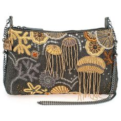 an embroidered purse with gold and black beads on the front, hanging from a chain