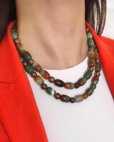 Agate and Lava Stone Multistrand Beaded Necklace ✅ NECKLACE FEATURES * Handmade Item: Each necklace is meticulously crafted by hand, ensuring quality and uniqueness. * Materials: patterned green and brown natural agate stone, brown lava stone, gold plated details and chain * Length: 43 cm (17 inches) + 5 cm (2 inches) adjustment chain.    -If you require a longer extension chain, please let me know. * Color Discrepancies: Please be aware that color variations may occur due to different monitor settings. * Natural Stone Variations: Natural stones may vary slightly in size, shape, and color tones due to their unique characteristics. These small differences make your jewelry special and one-of-a-kind. ⭐️ This elegant necklace features tube-shaped agate stones in green and brown tones, along w Agate Beaded Necklaces For Jewelry Making, Elegant Agate Beaded Necklaces With Colorful Beads, Vintage Beaded Necklace With Natural Stones, Elegant Agate Necklaces With Colorful Beads, Elegant Colorful Agate Beaded Necklaces, Bohemian Jade Necklace With Faceted Beads, Spiritual Agate Beaded Necklaces, Elegant Agate Beaded Necklace, Beaded Agate Crystal Necklace