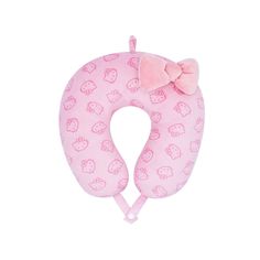 a pink neck pillow with a bow on it