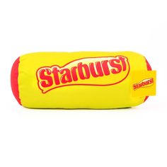 a yellow and red bag with the word starburst on it's side