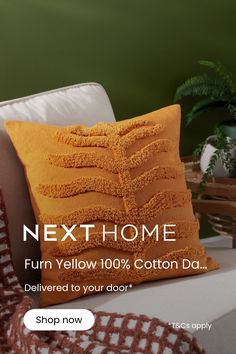 a couch with pillows on it and the text nexthome fun yellow 100 % cotton do