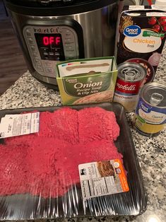 the meat is being cooked in an instant pot roaster and ready to be put into the slow cooker