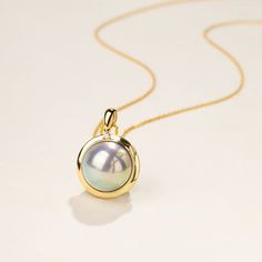 Material: 18K gold, and Mabe Pearl Mabe Pearl saltwater cultured pearl Size of pearl: 12.0-13.0 mm Handpicked of every pearl, only the top 1% of pearls are selected Handcrafted Lifetime warranty The price of this product is only the pendant price, and a 45cm adjustable 925 silver chain is given as a gift. Yellow Gold Mother Of Pearl Jewelry With Pearl Drop, Gold Mother Of Pearl Necklace With Pearl Drop, Formal Tahitian Pearl Necklace In Yellow Gold, Formal Yellow Gold Tahitian Pearl Necklace, Luxury Gold Pearl Necklace In Mother Of Pearl, Gold Pendant Pearl Necklace In Fine Jewelry, Luxury Gold Pearl Necklace With Pearl Charm, Gold Pearl Necklace With Pearl Pendant, Luxury Gold Mother Of Pearl Necklace