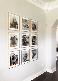 a white wall with pictures hanging on it's side and a wooden floor in front of it