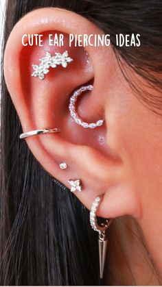 an ear piercing is shown with the words cute ear piercing ideas