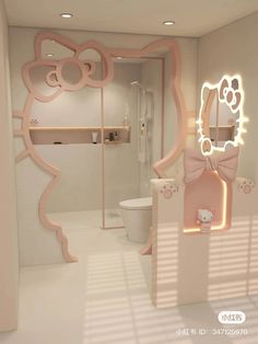 the bathroom is decorated in pink and white with hello kitty decorations on the mirror above the toilet