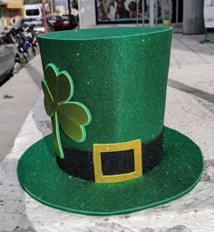 a green hat with a shamrock on it