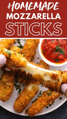 homemade mozzarella sticks on a plate with sauce