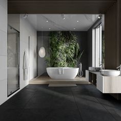 a bathroom with a large bathtub next to a walk in shower