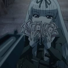 an anime character holding money in front of her face