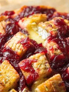 cranberry brie pull apart bread is shown on a plate with text overlay