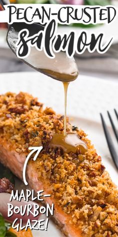 a piece of salmon being drizzled with maple bourbon glaze