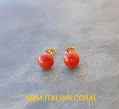 Meditareanian coral from italy/sardenia. 6mm smooth cabochon coral with 14k solid yellow gold posts and matching pushbacks. Beautiful color & great size for studs! Please note each coral is slightly different ...i do my best to find matching pairs. Corals are organic material that may have some imperfections..this is their beauty and charm ! MATCHING NECKLACE AVAILABLE IN MY SHOP- COMBINED SHIPPING Italian Coral Jewelry, Christmas Gift Earrings, Red Coral Earrings, Matching Pairs, Christmas Gifts For Wife, Coral Earrings, Natural Coral, Coral Jewelry, Wife Gift