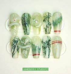 ✨ Hi, welcome to my little store! 💓 ✨ Here I have for you exclusive hand-painted nails that are salon-quality and original designs. If you love fancy nails with an artsy touch, and would like to take a dive into authentic Chinese aesthetics, this is your go-to place~ ✨ This elegant yet unique original design was inspired by traditional Chinese ink paintings, jade, and folktales. All the elements involved have auspicious meanings, a definite must-have for good luck and fortune ε(*･ω･ﾟ:･☆ 🍀 ✨ Ma Jade Nail Tutorial, Chinese New Year Nails Snake, Jade Gold Nails, Jade Inspired Nails, Year Of The Snake Nails, Green Chinese Nails, Earthy Nails Designs Green, Jade Nail Art, Chinese Porcelain Nails