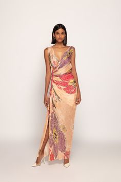 Periwinkle Bandhani Print, Hand Micro Pleated Overlap Style Sleeveless Maxi Dress With Adjustable Side Length, And Keyhole Detailing Materials used: Cotton Silk Color: Peach Product care: Dry clean only Beachfront Wedding, Peach Gown, Periwinkle Dress, Bandhani Print, Draped Dress, Kimono Dress, Guest Outfit, Sleeveless Maxi Dress, Contemporary Fashion