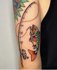 a woman's arm with a fish and fishing rod tattoo on the left side of her arm