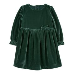 Looking for the perfect holiday dress? This sweet long sleeve dress for girls is just the right one! Made by Carters Child of Mine, this holiday dress for toddlers is stylish and chic in holiday green with a cute bow on the chest, and frilly sleeves. Shes got the perfect holiday photo look with all the festive flair! Whether youre heading to a holiday party or just hanging at home, she is ready for her close up! This toddler dress is made with the same trusted quality as Carter's and Standard 10 Toddler Holiday Dress, Frilly Sleeves, Girl Green Dress, Toddler Christmas Dress, Girl Holiday, Toddler Girl Shorts, Girls Holiday Dresses, Dressy Dresses, Dress For Girls