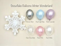 the snowflake balloons winter wonderland are available in different colors and sizes, including silver, light blue, pink, clear or pearl white