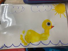 a child's drawing of a yellow duck in the water