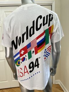 a mannequin wearing a white shirt with the words world cup 1994 printed on it