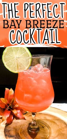 the perfect bay breeze cocktail is served in a glass with lime and garnish