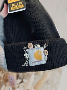 These are hand embroidered Carhartt hats! I am able to do them both in adult size as well as toddler size hats. You are able to pick whatever color hat you would like as well as the theme/color scheme of the floral design. So excited to work with you! Carhartt Beanie Embroidery, Embroidered Carhartt Beanie, Calming Crafts, Carhartt Hats, Carhartt Beanies, Beanie Design