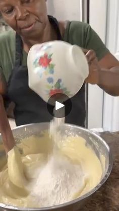 an old man pouring batter into a bowl