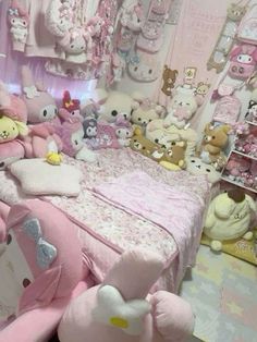 a room filled with lots of stuffed animals next to a bed covered in pink sheets