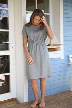 "Minimal linen dress with mobile waist. Women's dress with side pockets and an elastic waist. Hand made from washed very soft middle weight linen fabric. Details: - Made of 100% natural washed and soft medium weight (205 g/m Oeko-Tex certified linen; - colour: Grey, but could be any from our 25 available colours (colour palette is below); - pre washed linen fabric; - there is no zipper; - with two side pockets; - with an elastic waist - making time approx. 3-5 working days; Length from the lower Linen Wedding, Dress With Elastic Waist, Elegant Sweater, Elastic Waist Dress, Summer Linen Dresses, Kimono Sleeves, Linen Style, Dove Grey, Womens Dress