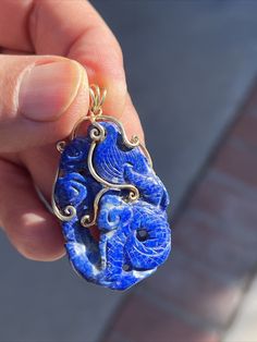 This beautiful dragon and blossom hand carved natural lapis weight 11.5 grams with solid 14 k gold with hallmark possible from old China Some photos taking in outdoor light Lapis Jewelry, Chinese Jewelry, Antique Jewelry Necklace, Beautiful Dragon, Dragon Jewelry, Dragon Pendant, Outdoor Light, Mixed Metals, Vintage Watches